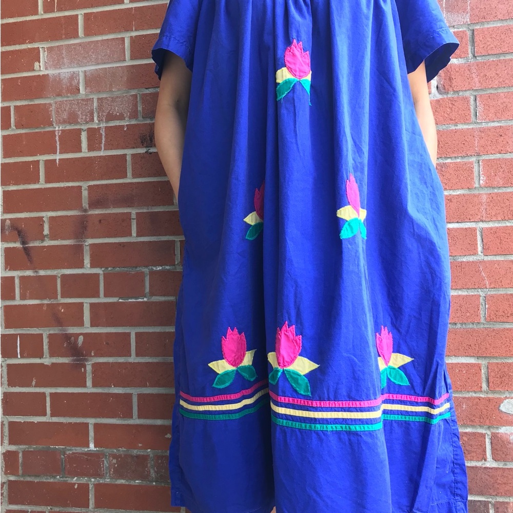Vintage cobalt blue dress with floral appliqués